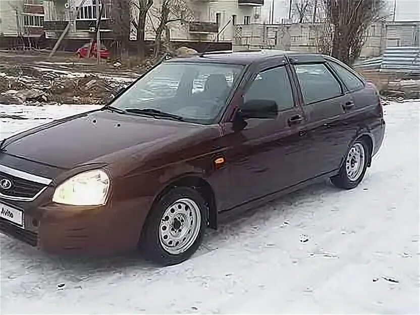 Логан рестайлинг 3. Ваз 2112 опал 419. Приора белая 2010 код краски. Автосалон на пл. Форд фокус седан 2012.