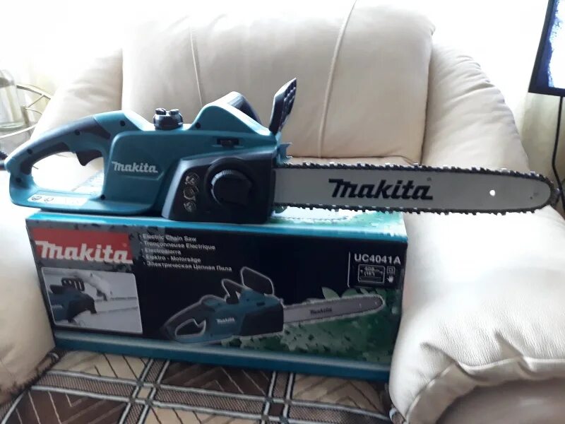 Пила цепная uc4041a. Makita uc4041a. Электропила Макита uc4041a. Makita uc4041a кейс. Пила цепная Makita uc4041a.