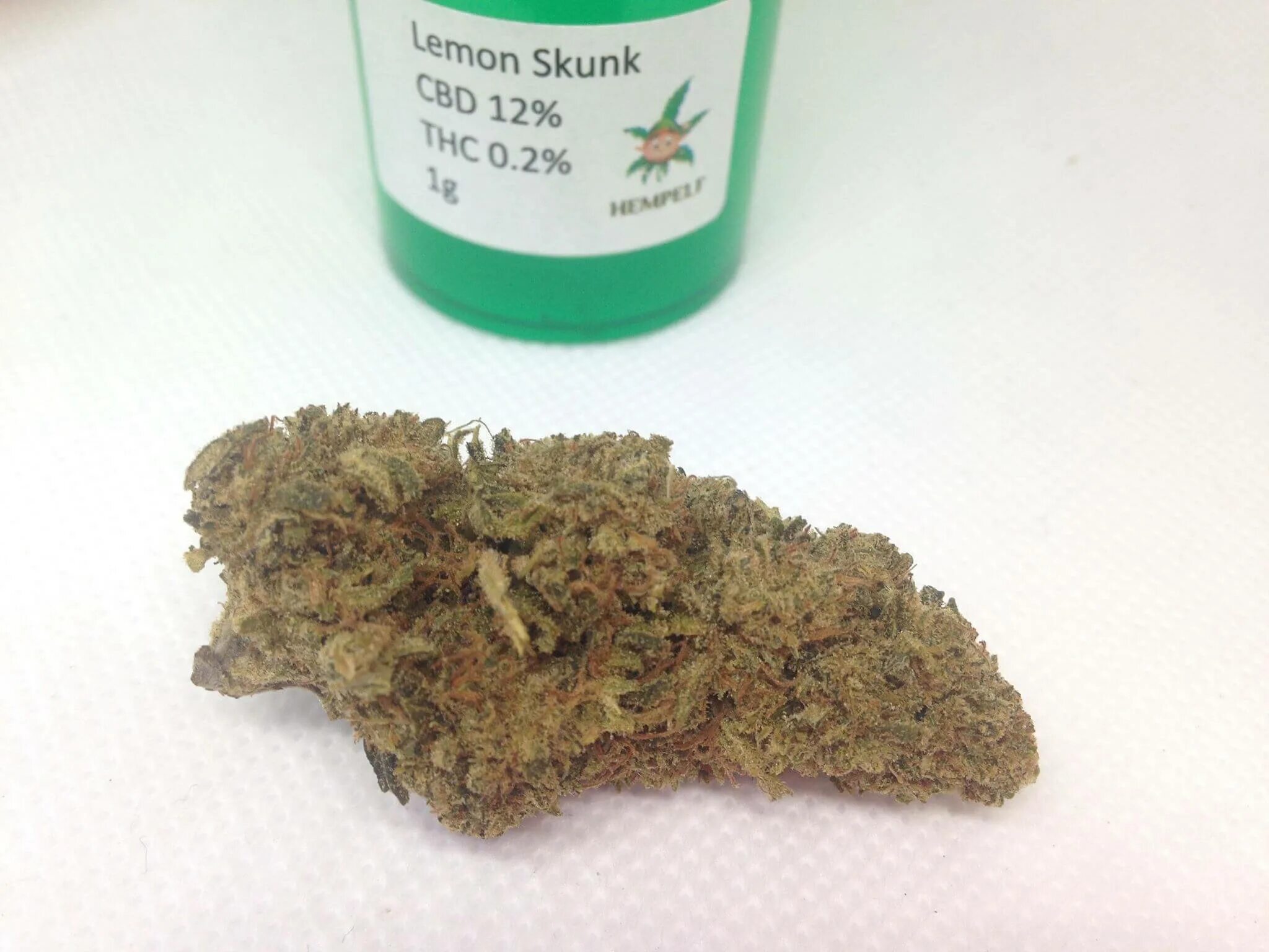 Зип сканка. Lemon skunk. шишки сканк. skunk weed. картинка из упакоыки сканка.