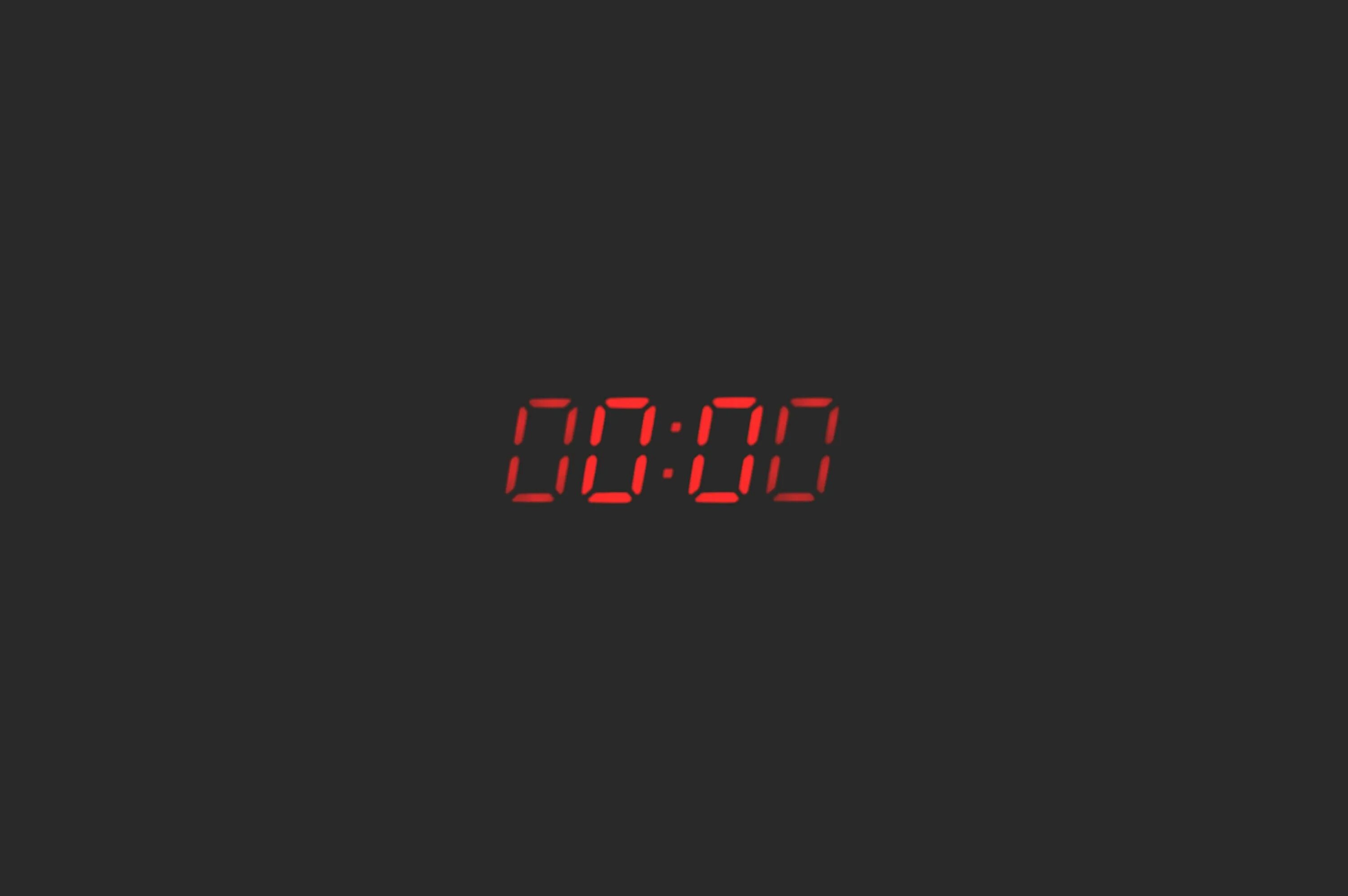 Схема электрооборудования УАЗ 3151. Электронные часы на черном фоне. Часы 00 00. На часах ноль ноль.