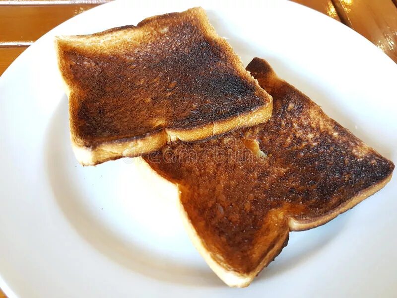 Подгорелый хлеб. Подгоревший тост. Горелый тост. Сгоревший хлеб