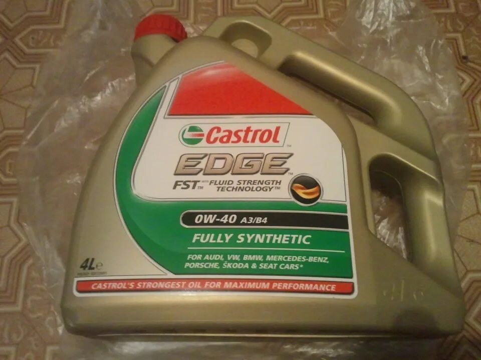 157e6b Castrol. Castrol Edge Supercar 10w-60. Моторное масло Castrol 15a008. Castrol Edge 10w60 Старая канистра. Канистра масла 4 л