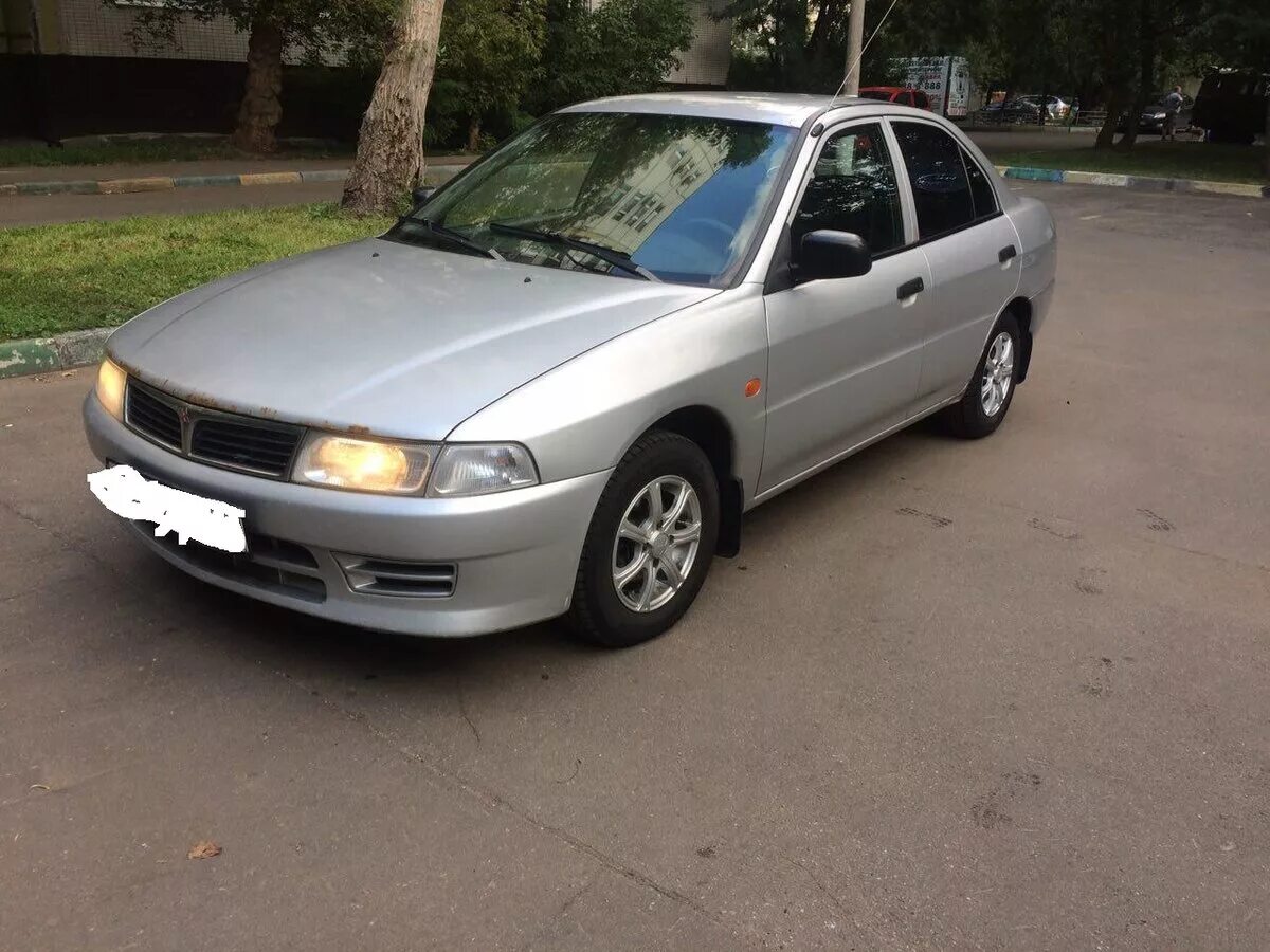 Митсубиси 2000 купить. Mitsubishi Lancer VII 2000. Митсубиси седан 2000. Mitsubishi Lancer 7 1.3. Митсубиси Лансер VII 1.3.