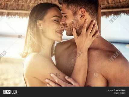 Photo Of Attractive Couple In Love Embracing Each Other. 