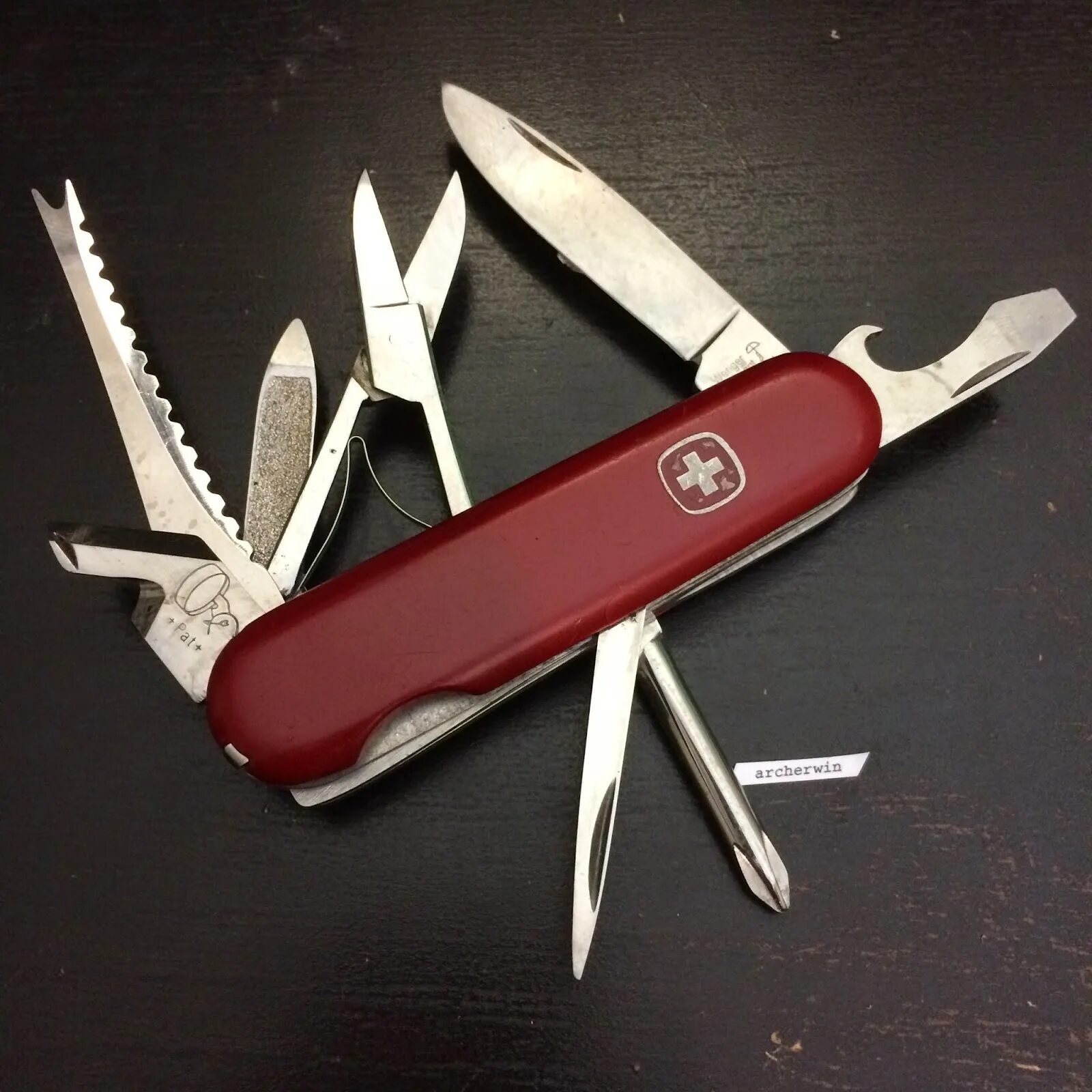 Army knife top front. Victorinox compact. 5. Wenger forester scissors. Victorinox compact black.