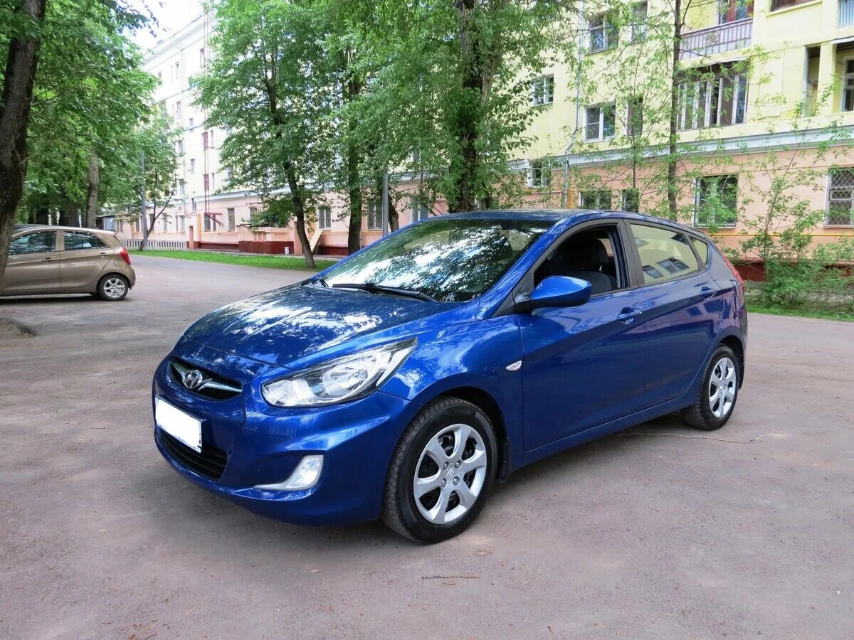 Хендай солярис 2012. Hyundai Solaris 2012 хэтчбек голубая. Хендай Солярис 2012 синий. Хендай Солярис хэтчбек синий.