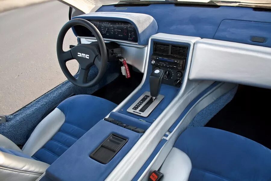 Delorean dmc-12 салон. Dmc delorean салон. Салон 12 машины. Ваз 2112 купе салон. Де лореан dmc-12.
