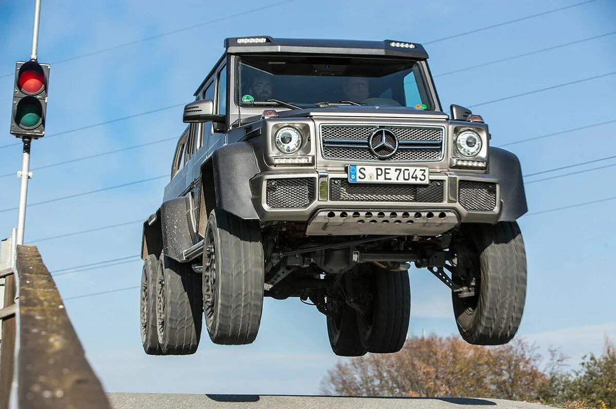 6 4 car. Mercedes-Benz g63 AMG 6x6. 2014 Mercedes-Benz g63 AMG 6x6. Внедорожник Мерседес Гелендваген монстр. Мерседес g63 монстр трак.