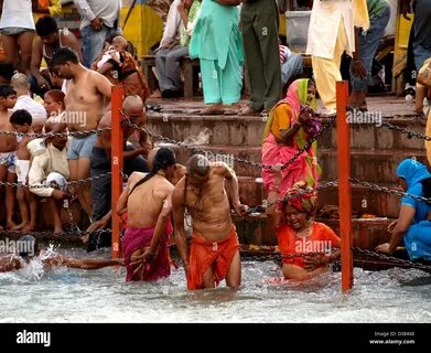 Crowd of pilgrims at a holy bath at Maha Kumbh, Allahabad, Uttar Pradesh, I...