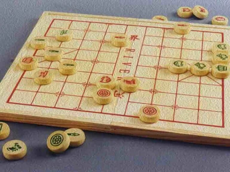 Шахматы сянци фигуры. Xiangqi китайские шахматы. Китайские шахматы сянци. Xiangqi китайские шахматы. Игра в китайские шахматы.