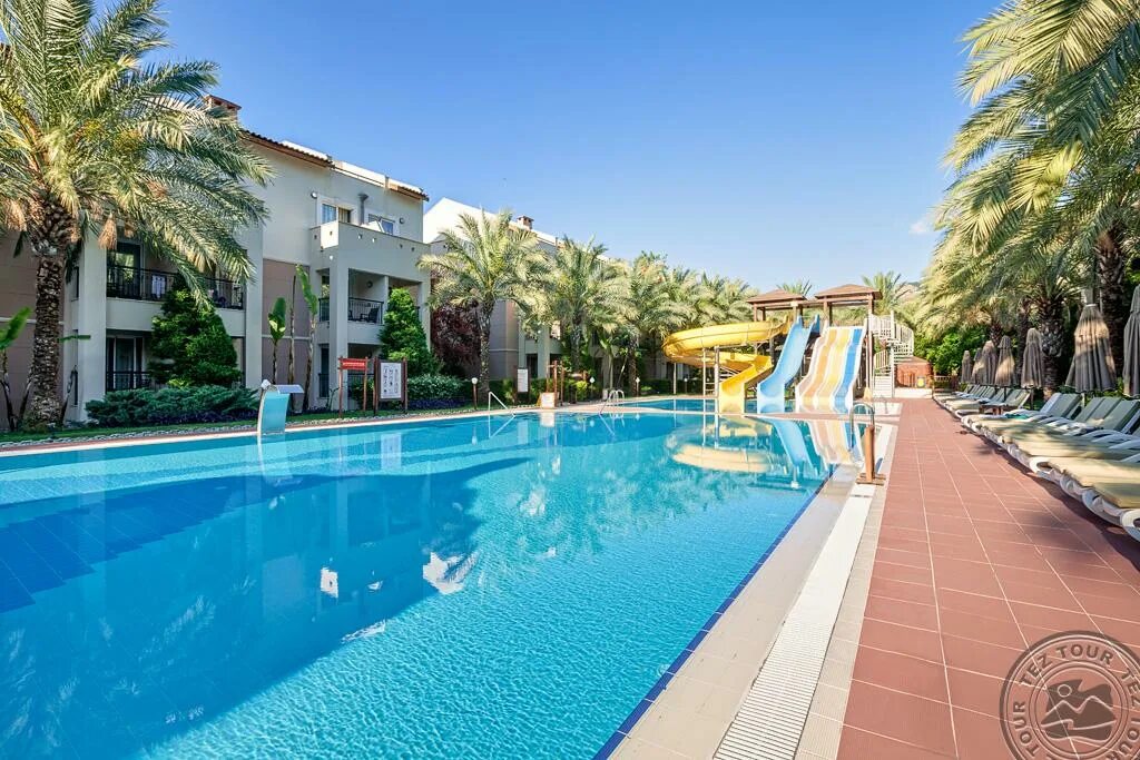 Амара комфорт. Alkoclar exclusive 5 турция кемер. Amara wing resort 5 кемер турция. Fun sun family comfort beach 5 номера. Турция амара винг резорт.