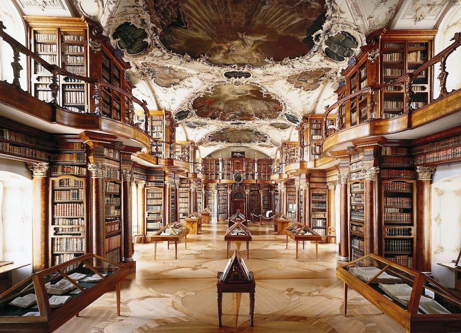 Библиотека в ней находится. Библиотека монастыря Святого Галла в Швейцарии. Библиотека аббатства Санкт-Галлен, Швейцария. Монастырь Санкт Галлен библиотека. Библиотека монастыря Санкт-Флориан, Австрия.