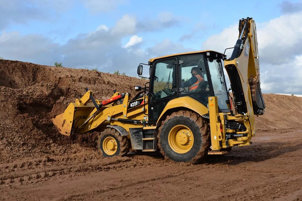 Экскаватор погрузчик краснодар. Экскаватор-погрузчик Caterpillar 428f2. Катерпиллер экскаватор погрузчик 428. Экскаватор погрузчик Cat 428f. Погрузчик Caterpillar 428f.