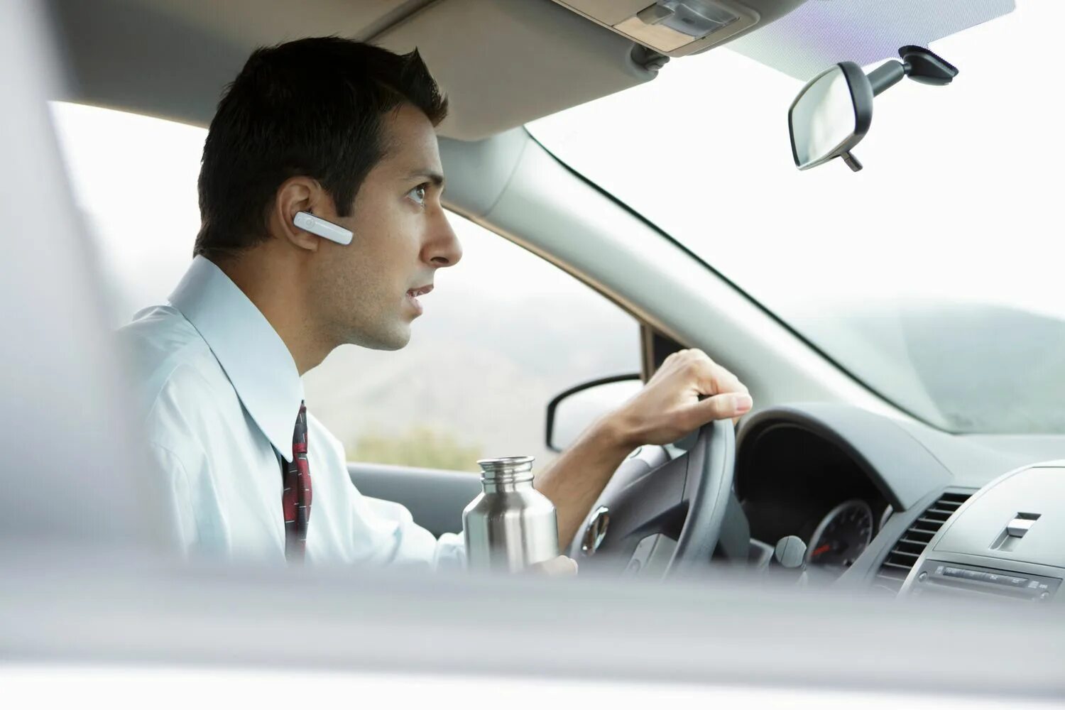 Driving car Bluetooth Phone. Driving Bluetooth. Driving talk on Phone. Talking Phone in car.