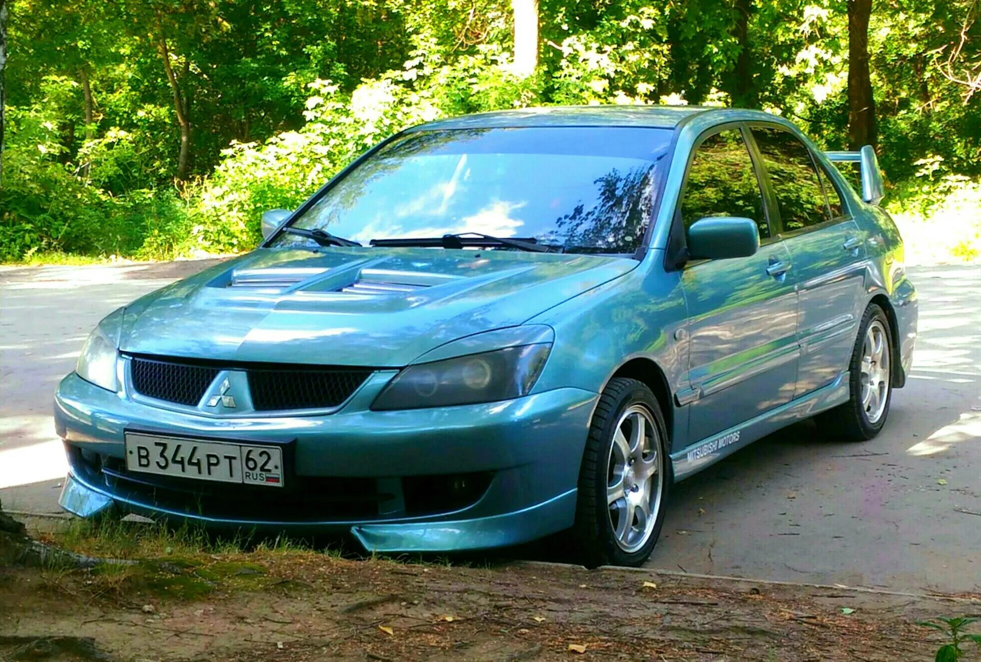 Mitsubishi lancer 9 кузов. Mitsubishi Lancer 9. Митсубиси Лансер 9 1.6. Mitsubishi Lancer 1.6 2006. Митсубиси Лансер 9 поколения.