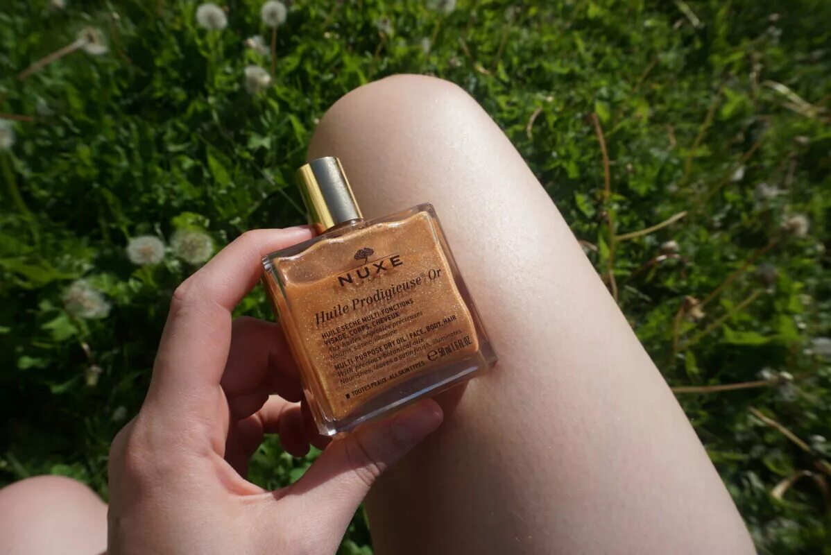 Huile seche multi usages hydratante multi purpose moisturizing dry oil. Nuxe масло для волос. Масло для тела nuxe. Nuxe масло для лица и тела золотое , тела и волос huile prodigieuse or. Nuxe масло с шиммером.