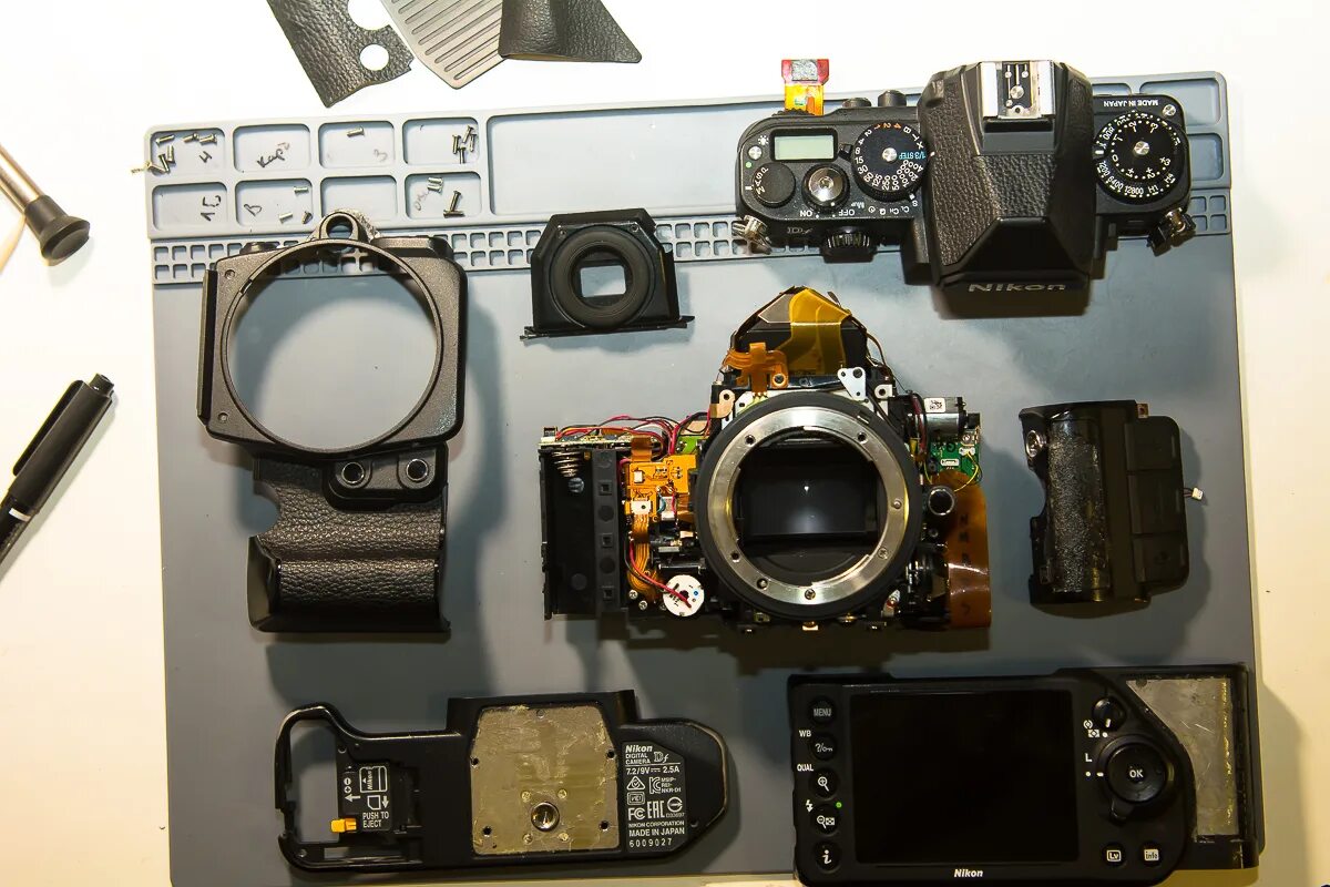 Стоимость ремонта nikon. Nikon DF. Детали фотоаппарата Nikon. Ремонт камер.