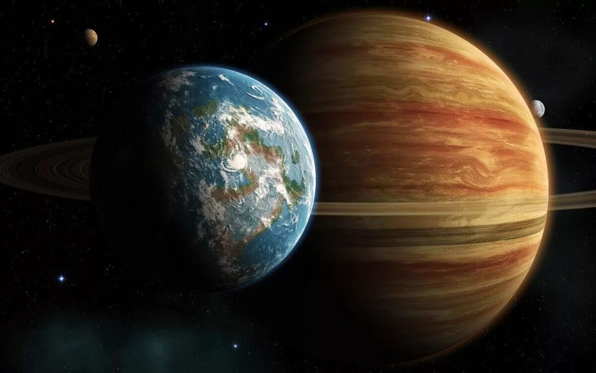 Самый большой океан в солнечной системе. Юпитер Планета. Юпитер Сатурн и земля. Планеты гиганты Юпитер. Юпитер Планета солнечной системы.
