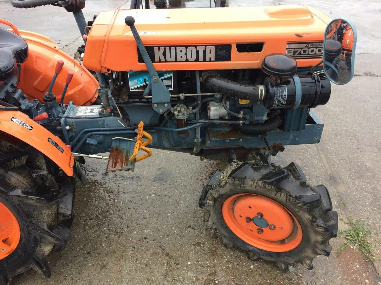 Мини трактор кубота. Минитрактор Kubota b7000. Минитрактор Кубота б 7000. Минитрактор Кубота YM 1100. Кубота b5001.