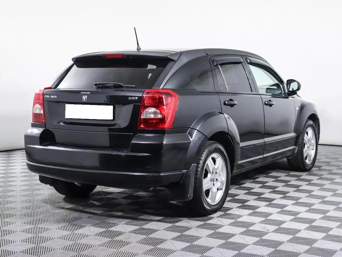 Dodge caliber 2.0. Dodge Caliber 2.0 CVT, 2007. Додж Калибер 2.0. Додж Калибер черный. Dodge Caliber 2.0 CVT грузовой отсек.