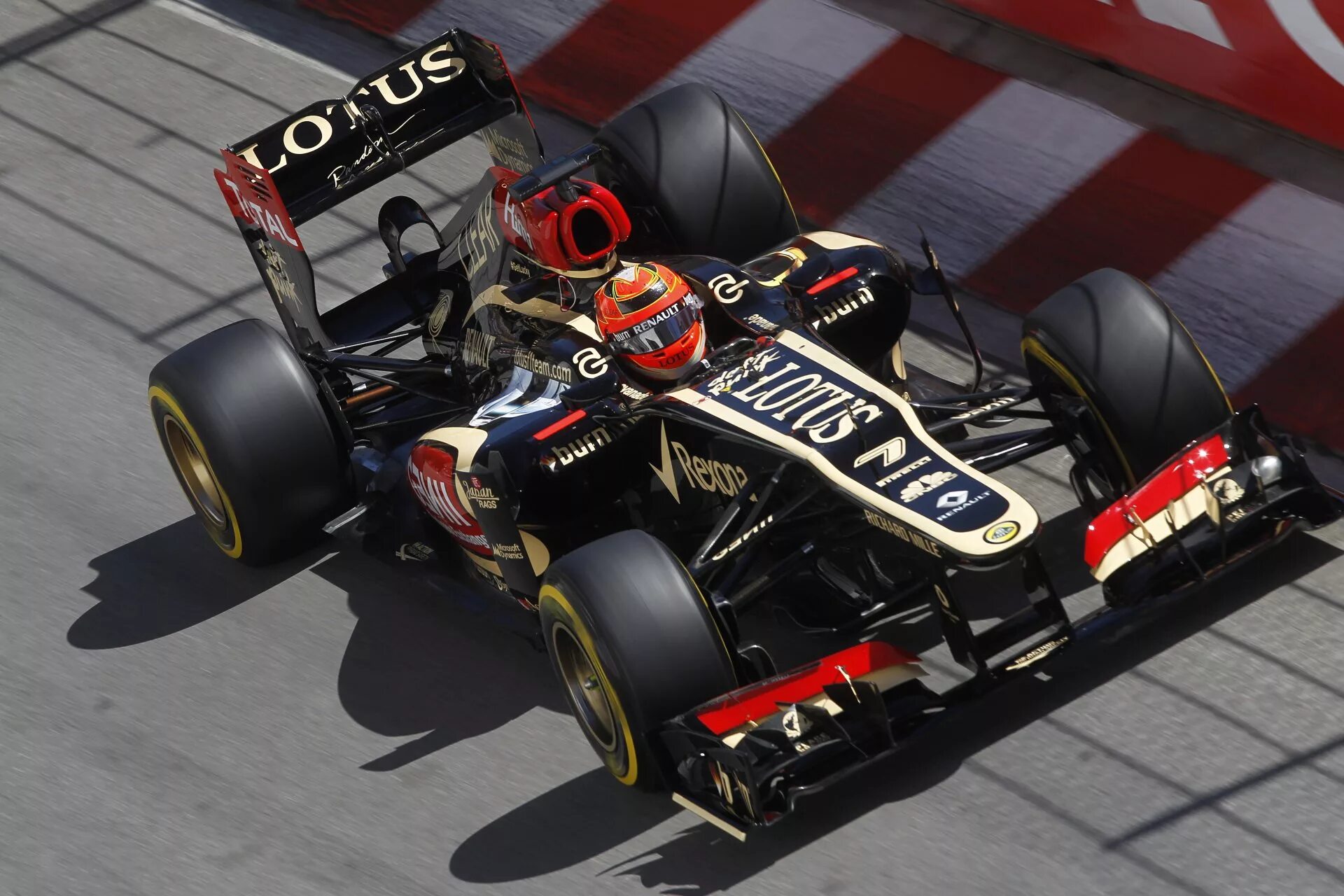 Болид Lotus f1. Лотус машина ф 1. Лотус ф1 2013. Болид формулы 1.