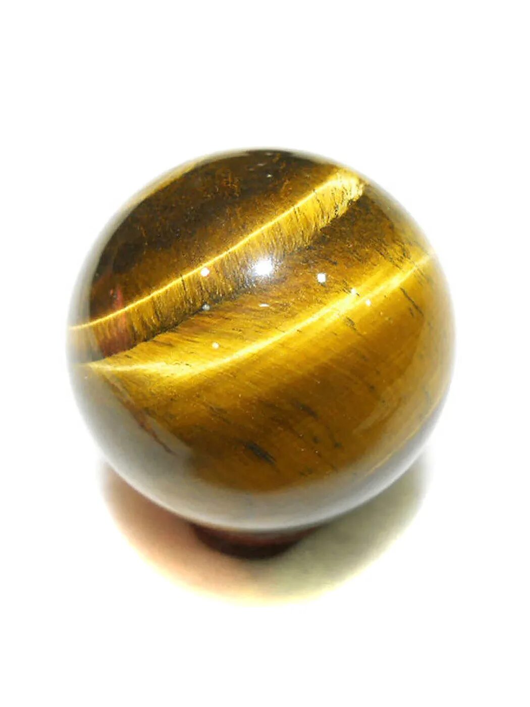 Тигровый камень купить. Тигриный глаз камень. Yellow Tiger Eye камень. Кварц тигровый глаз. Кошачий и тигровый глаз камень.