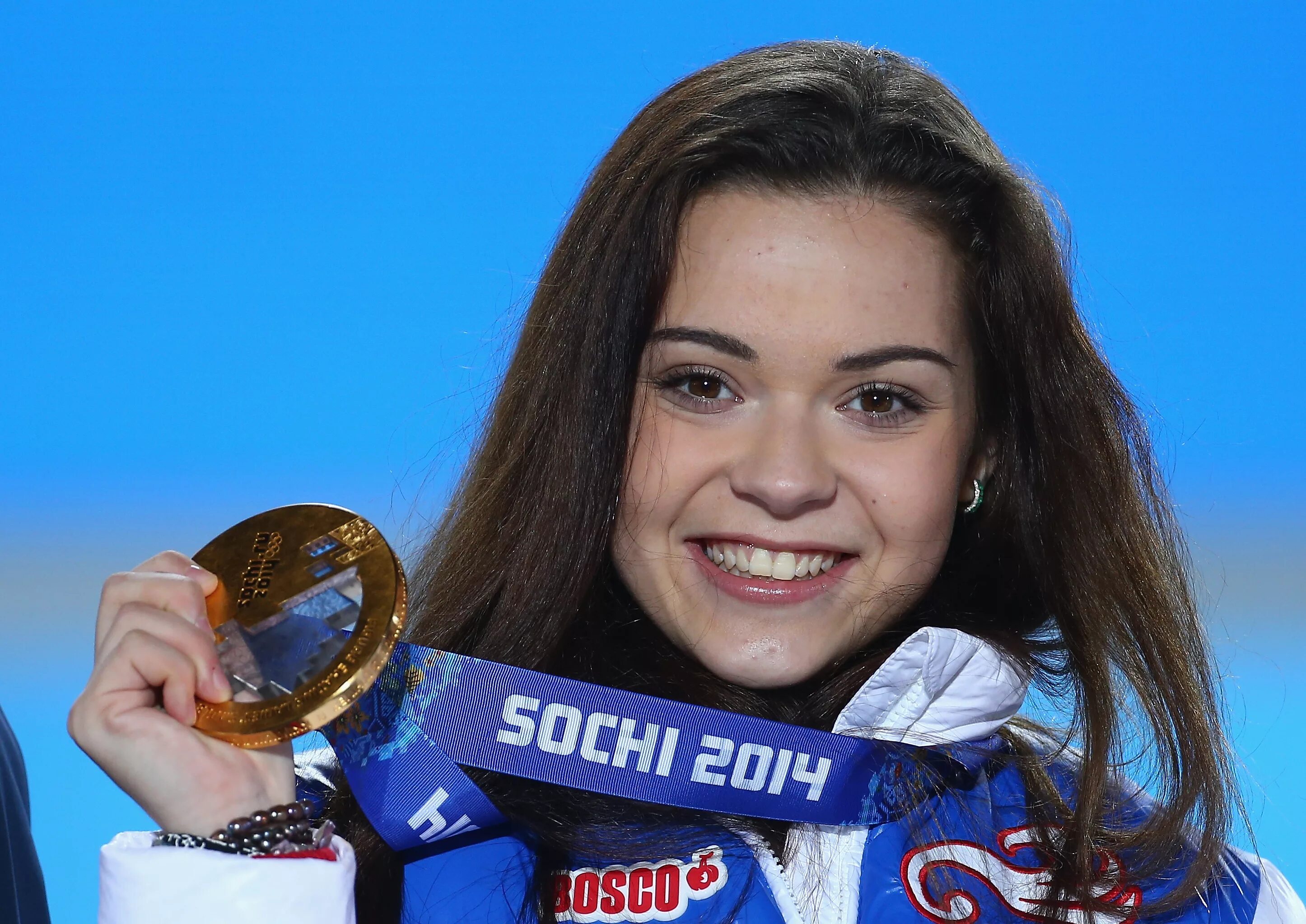 Фигуристка олимпийская чемпионка сочи 2014 липницкая. Липницкая олимпийская чемпионка. Олимпийская чемпионка по фигурному катанию в сочи. Олимпийская чемпионка по фигурному катанию в сочи. Олимпийская чемпионка по фигурному катанию в сочи.