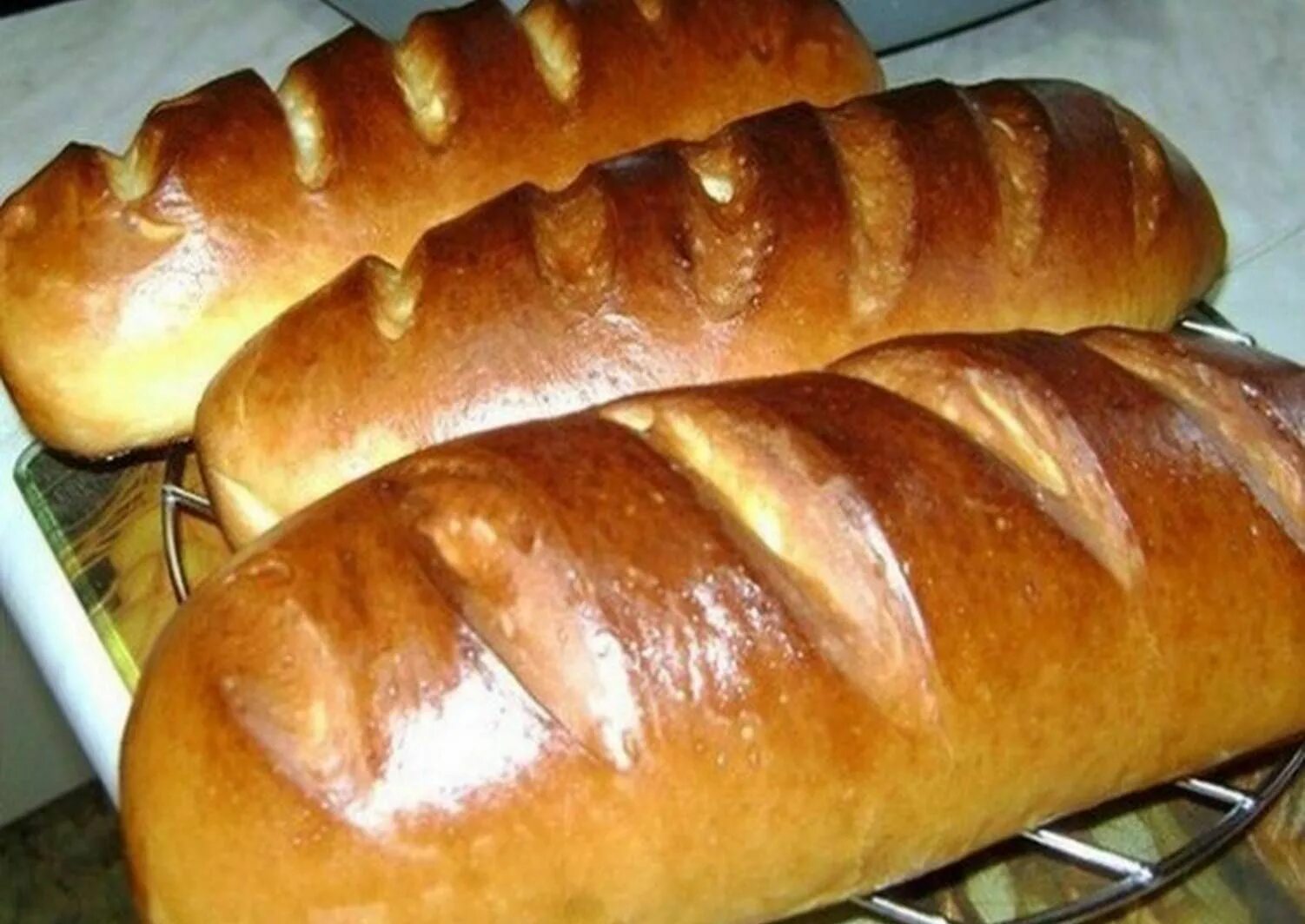 Хлеб в духовке в рукаве. Батон. Домашний батон в духовке. Батон хлеба. Домашний хлеб батон.