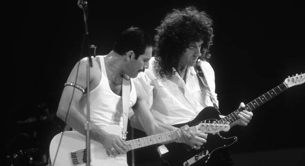 Концерт группы квин. Группа Квин 1985. Группа Квин Live Aid. Группа Квин концерт 1985. Queen концерт Live Aid.