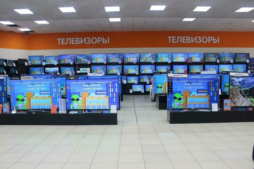 Dns санкт-петербург dns. Корпорация центр каменка пензенской. Магазин центр телевизоры. Магазины техники телевизоры. Магазин центр телевизоры.