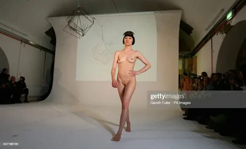 A model on the catwalk during a naked catwalk show by milliner Robyn... 