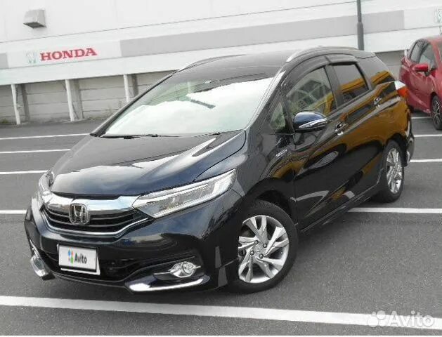 Хонда шаттл гибрид 2016. Honda shuttle hybrid 2017. Диски хонда шаттл. Honda shuttle владивосток. Хонда шатл 2018 белого цвета.