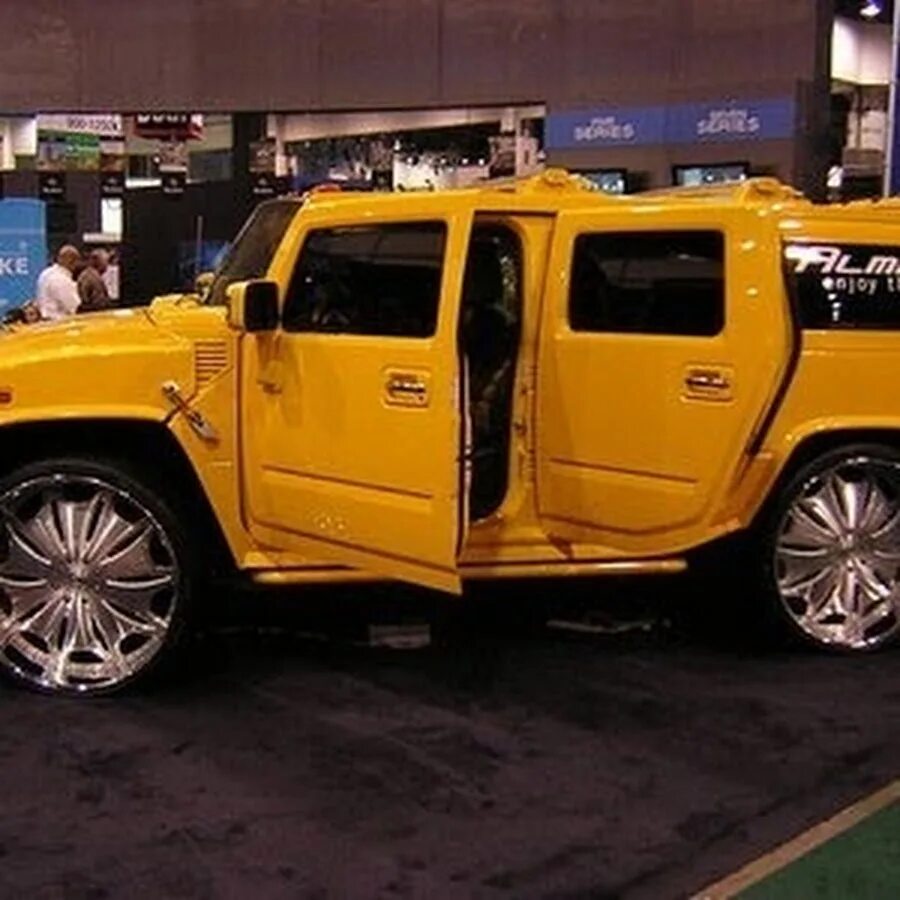 Yellow Hummer 2003 Yellow Hummer H2 SUV. I want one of these a long time from no