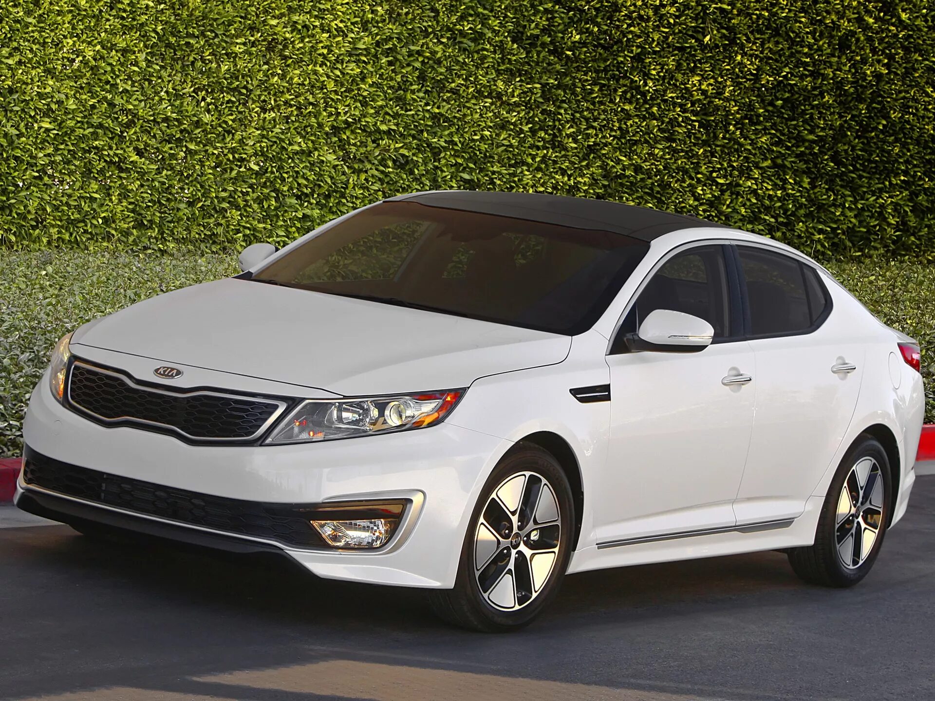 Optima est. Kia Optima Hybrid 2012. Kia Optima Hybrid 2011. Kia Optima Hybrid 2013. Киа Оптима 2011 гибрид.