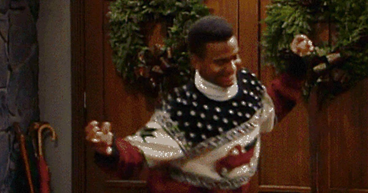 Time does the party start. Christmas party gif. let&#039;s get party started. man in sweather dancing gif. really happy.
