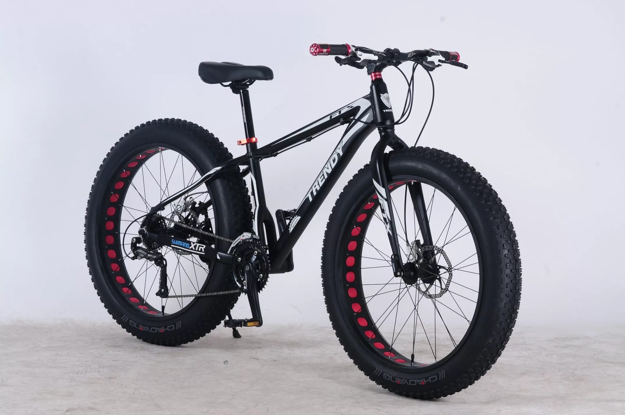 Item 2018. Trinx t106. Фэт байк Fatbike 26" Trinx t106 рама 16" Shimano черный матовый. МТБ С большими колесами. Мингой велосипед 29 дюймов.