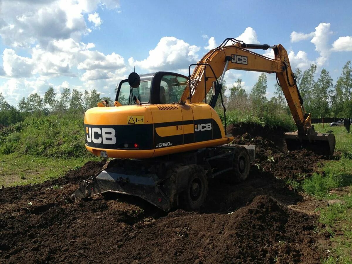 Колесный экскаватор JCB js160w. Колесный полноповоротный экскаватор JCB js160w. JCB 160w колесный экскаватор. JCB 160 колесный экскаватор. Аренда колесного полноповоротного экскаватора