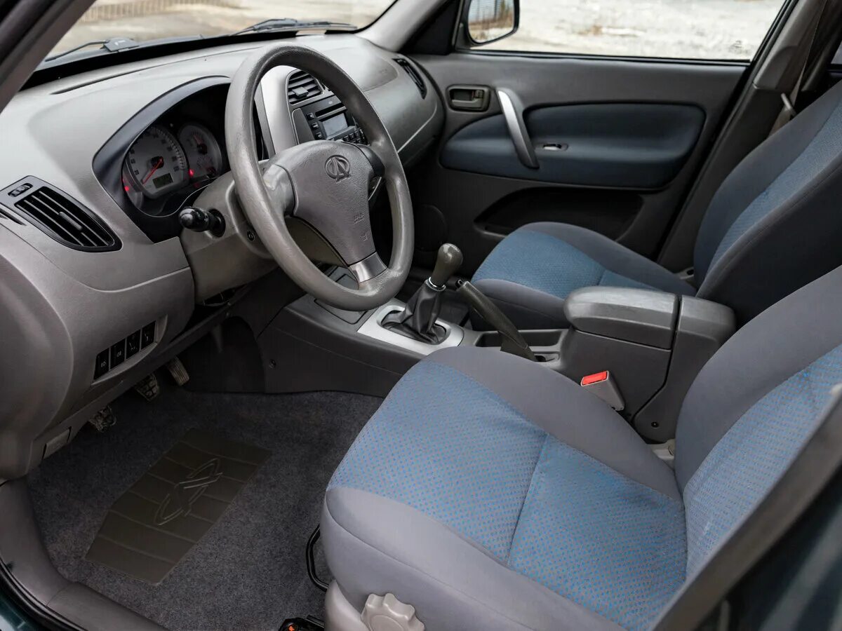 Chery tiggo t11 салон. Чери тигго т11 2009. Машина чери тигго т11. Чери тигго т11 не работает. Chery tiggo t11 i салон.