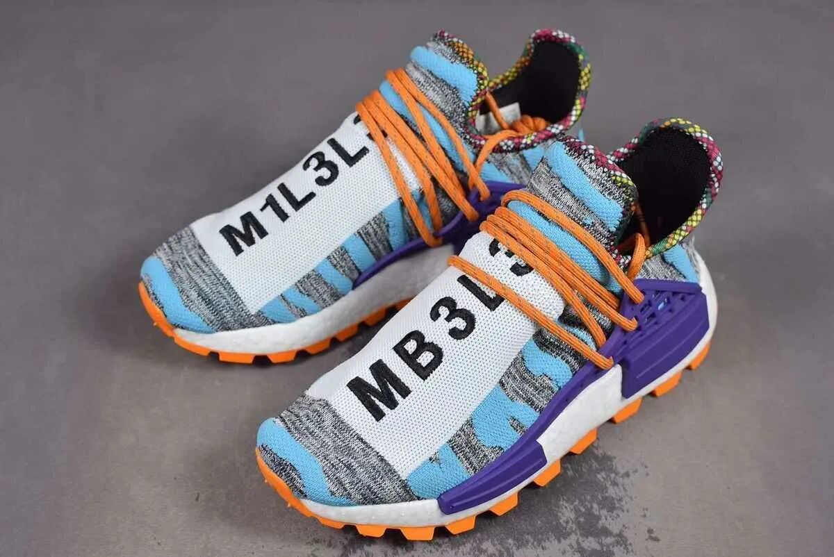 Кроссовки дорогие бренды. Adidas NMD hu Pharrell. Adidas Pharrell Williams кроссовки. Adidas NMD Pharrell Williams. Кроссовки adidas Pharrell x NMD Human Race Trail 'Solar Pack', черный.