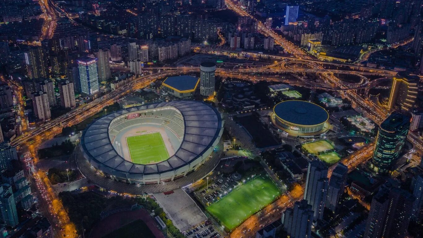 Стадионы китая. Шанхай стадион. Шанхай стадион Шэньхуа стадион. Теннисный стадион Шанхай. Стадион Китай 2023.
