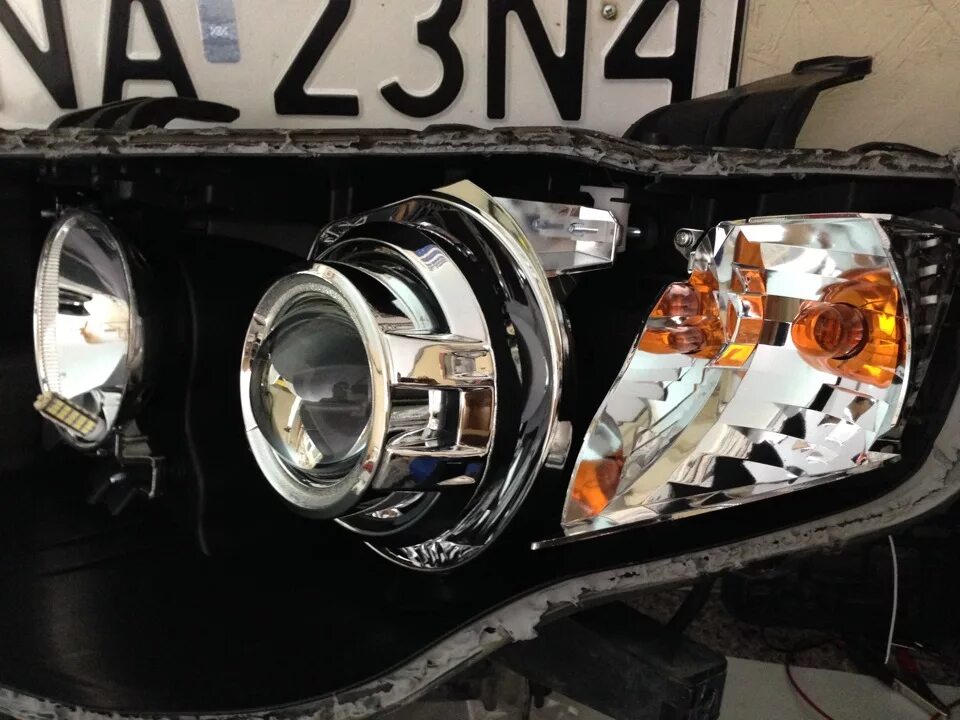 Фары линзы mitsubishi outlander. Mitsubishi outlander 3 линзы. Линзы в митсубиси аутлендер 3. Линзы на аутлендер хл 2008. Установка линз на outlander 3.