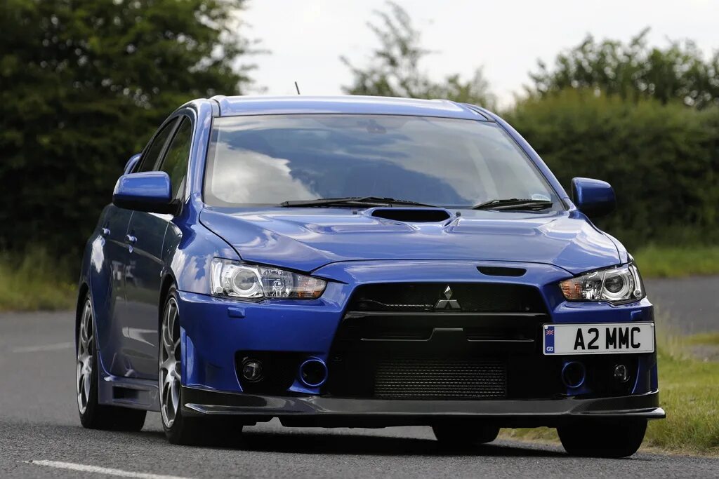 Mitsubishi evo x. Mitsubishi Lancer Evolution x FQ-400. Mitsubishi Lancer Эво 10. 2009 Mitsubishi Lancer Evolution x FQ-400. Lancer 10 Evolution fq400.