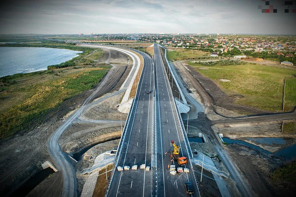 Компания новый дороги. Автомагистраль Ростов на Дону. Современные дороги. Современная автомагистраль. Стройка дороги.