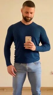 Selfie with sweater in bulging jeans. Sexy bearded men, Skin
