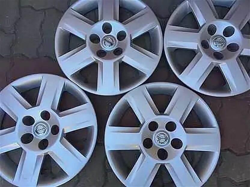 Колпак колеса nissan r16. Колпак nissan арт. Колпаки на 16 диски ниссан. Колпаки ниссан р16. Декоративные колпаки на ниссан х трейл.