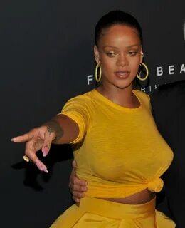 Rihanna bra less