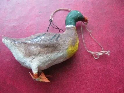 Елочная игрушка утка