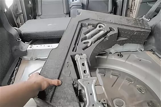 Removal and installation of facings and upholstery of the trunk Nissan Qashqai