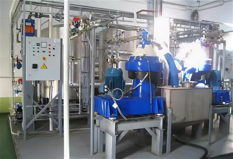 производство сои. производство масла завод. куча зерна. гк содружество соя калининград. завод переработки сои.