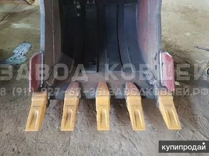 Межзубьевая защита ковша экскаватора